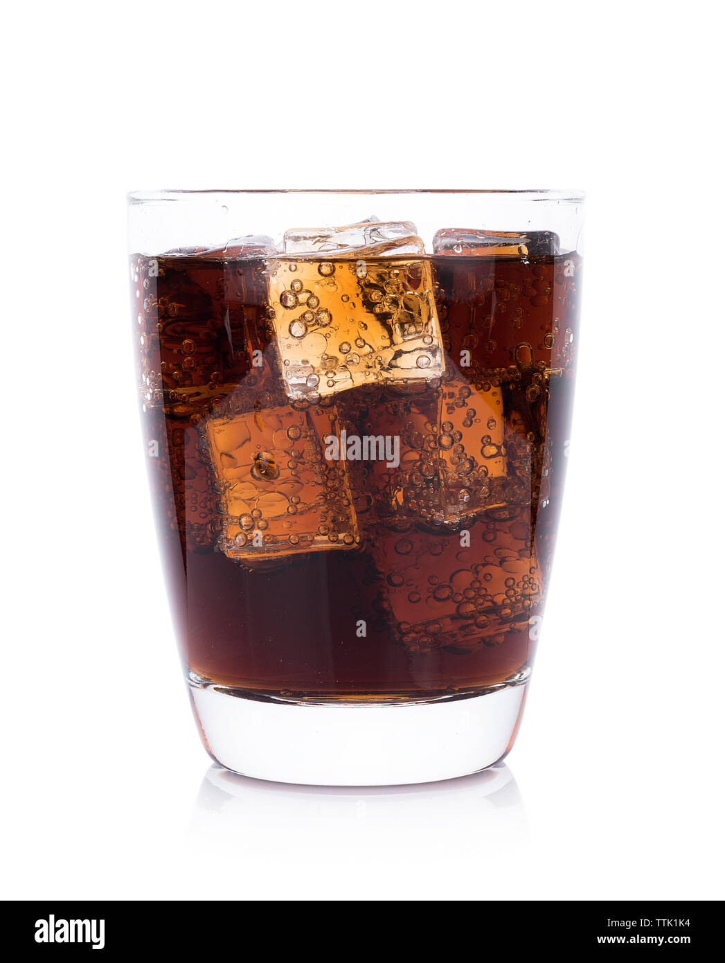 Cola in glass with ice cubes on white background Stock Photo - Alamy