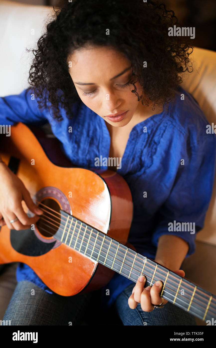 Old black woman sitting on sofa hi-res stock photography and images - Alamy