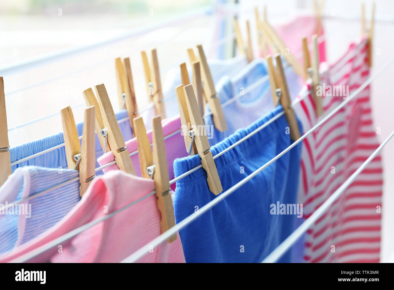 Drying baby clothes, close up Stock Photo Alamy