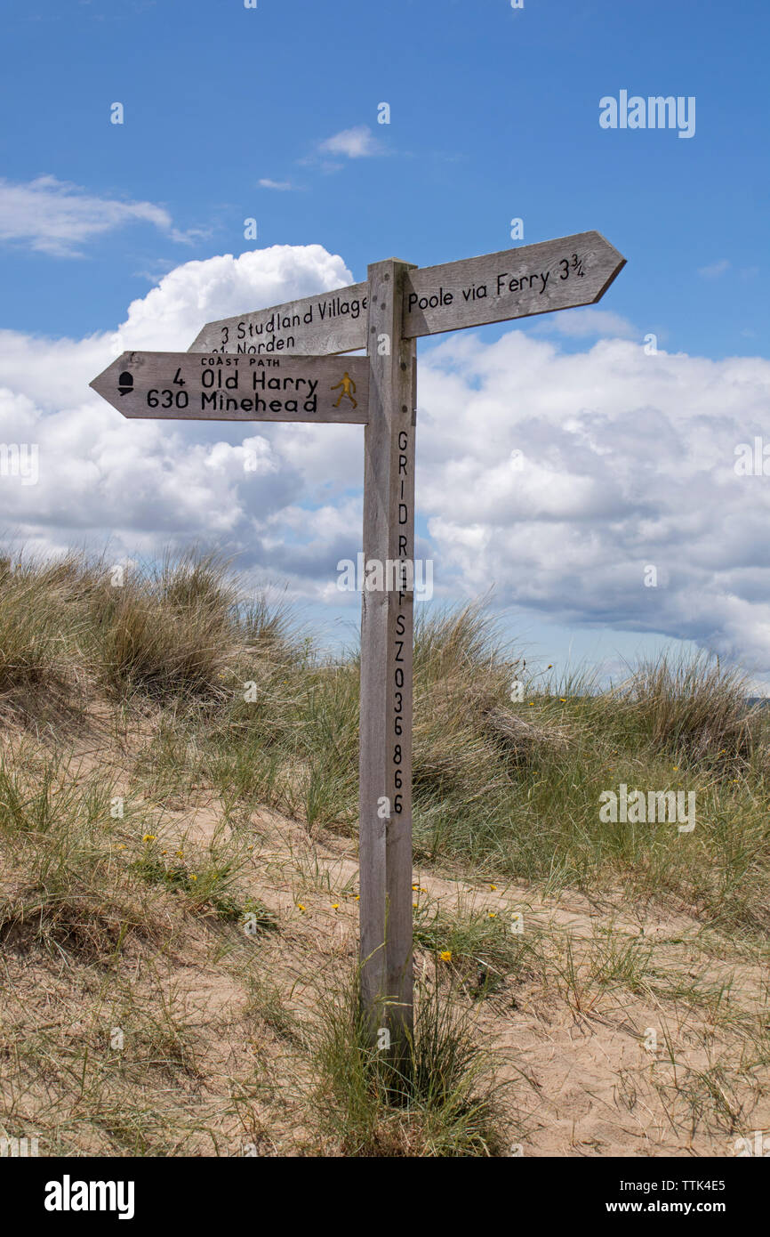Footpath sign to Studland, Pool and Old Harry Rocks, Dorset, England, UK Stock Photo