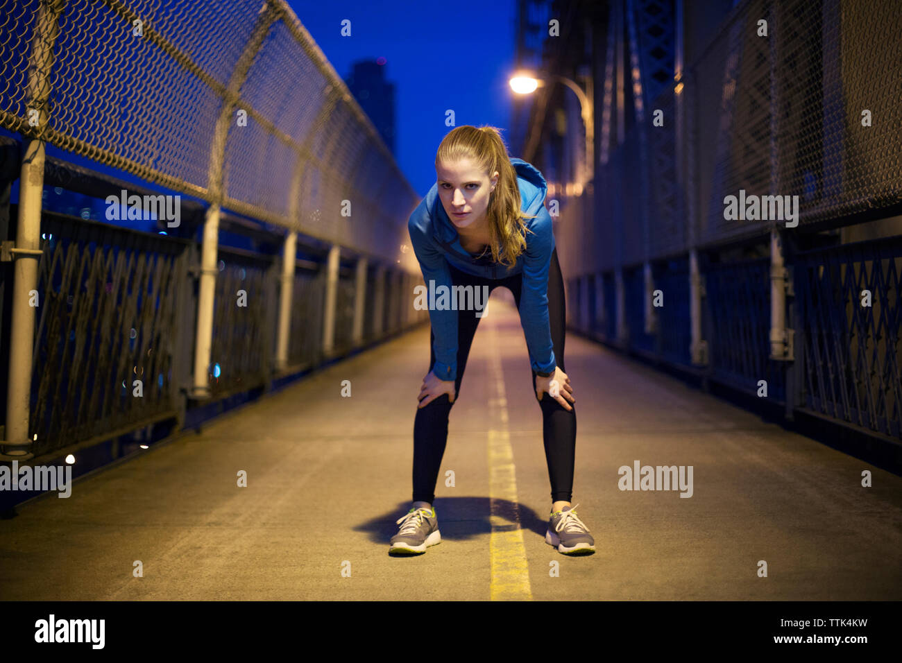 Woman bending over front hi-res stock photography and images - Alamy