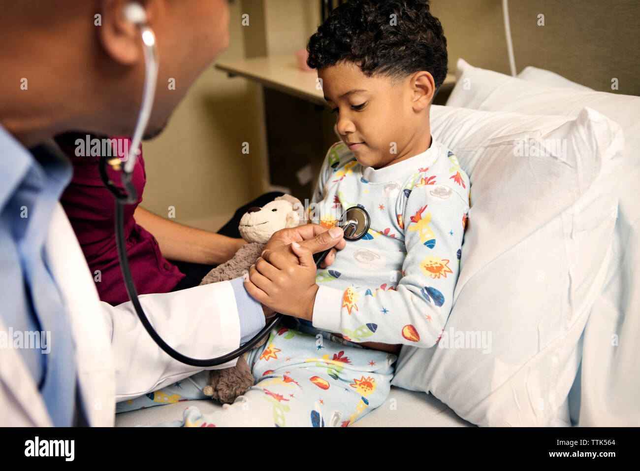 Boy sitting in hospital bed hires stock photography and images Alamy