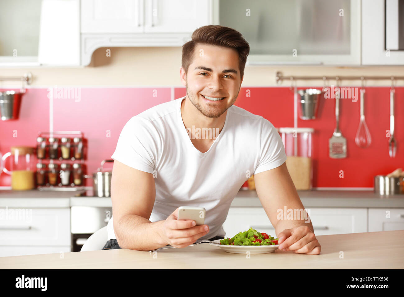 Athlete eating in table hi-res stock photography and images - Alamy