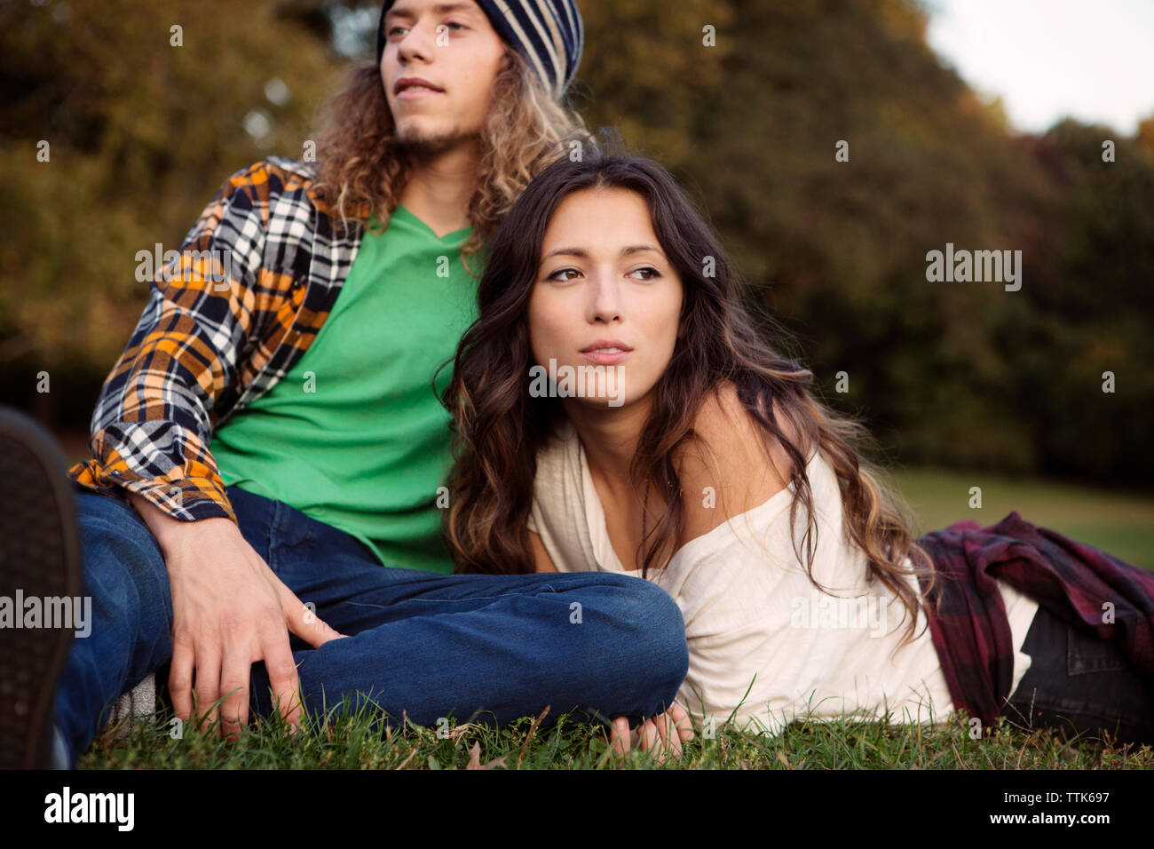 Couple man woman sitting on hi-res stock photography and images - Alamy
