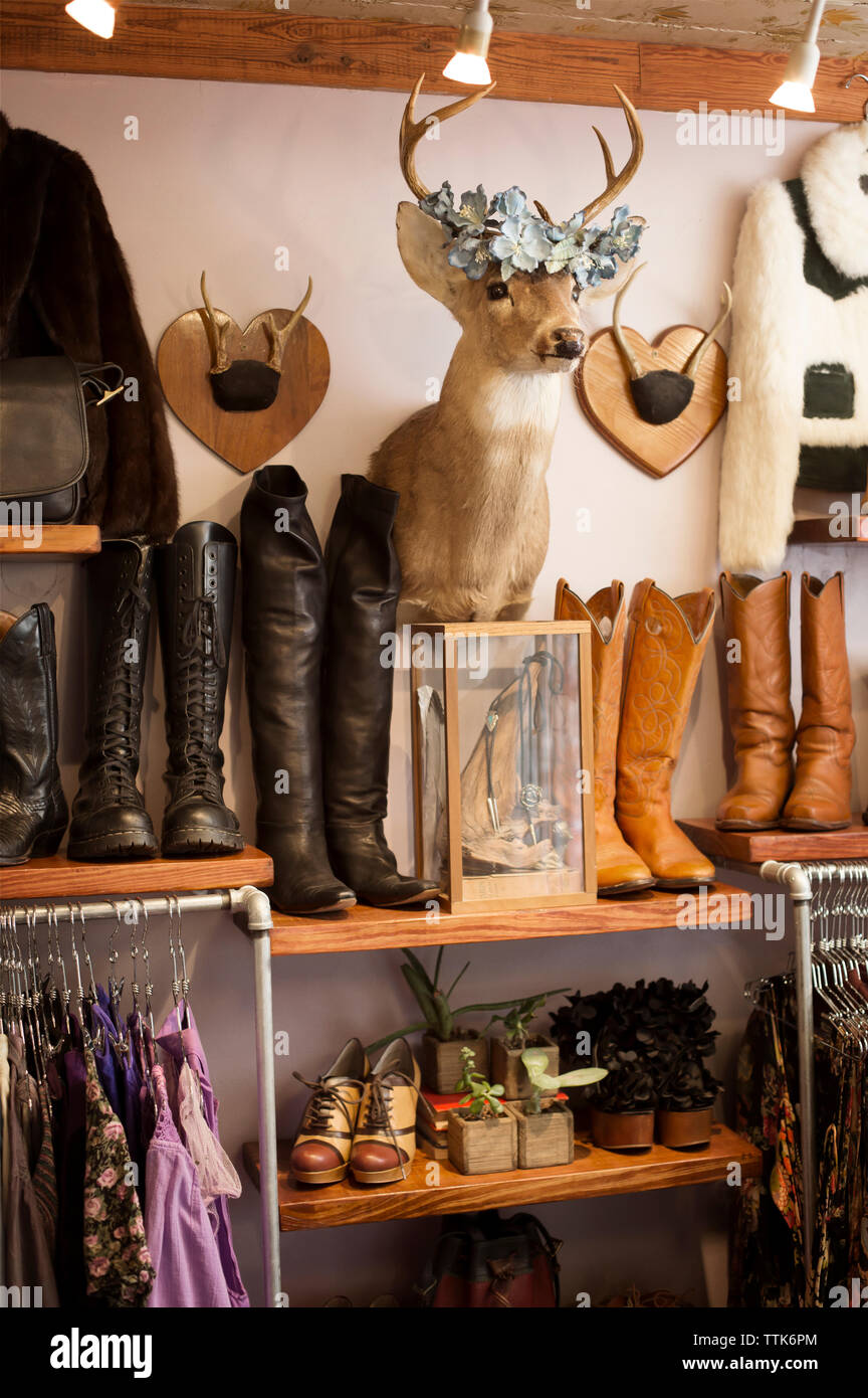 Products and merchandise arranged at boutique Stock Photo - Alamy