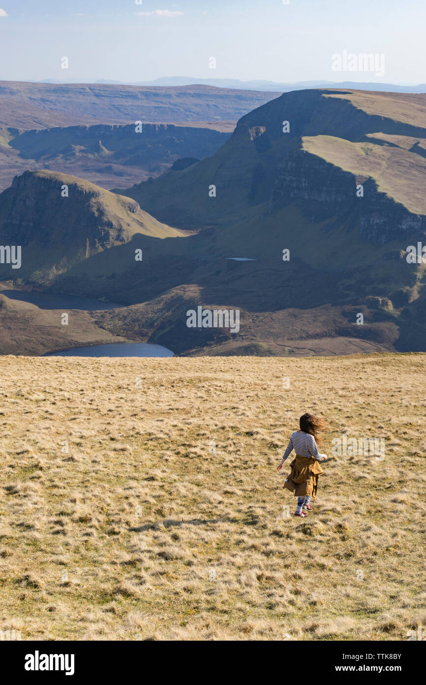 Old woman grass walking mountains hi-res stock photography and images ...