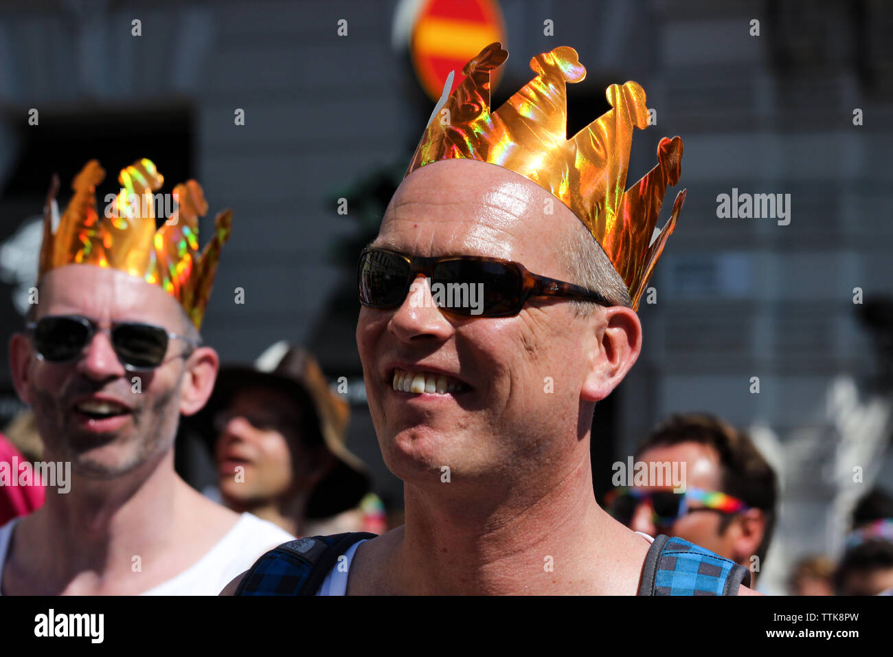 Man wearing cardboard crown at Helsinki Pride parade 2016 in Helsinki, Finland Stock Photo