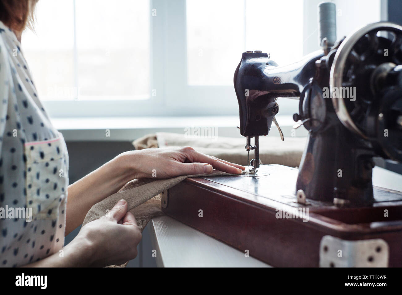 Woman sewing machine hi-res stock photography and images - Alamy