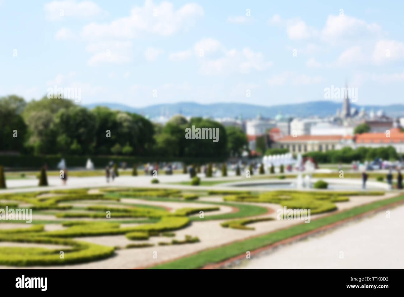 Beautiful green garden with fountain Stock Photo - Alamy
