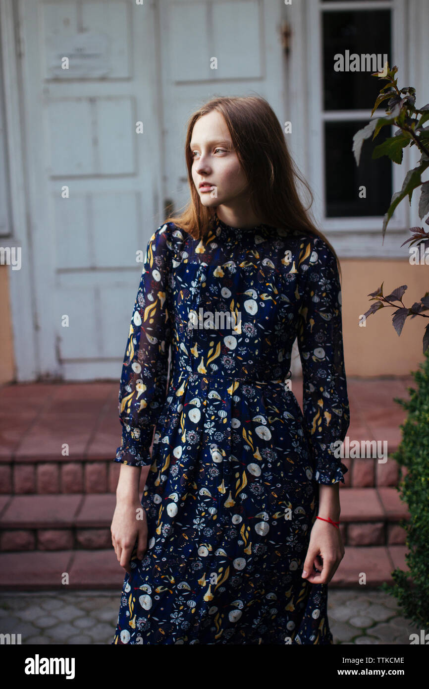 Woman steps dress hi-res stock photography and images - Alamy