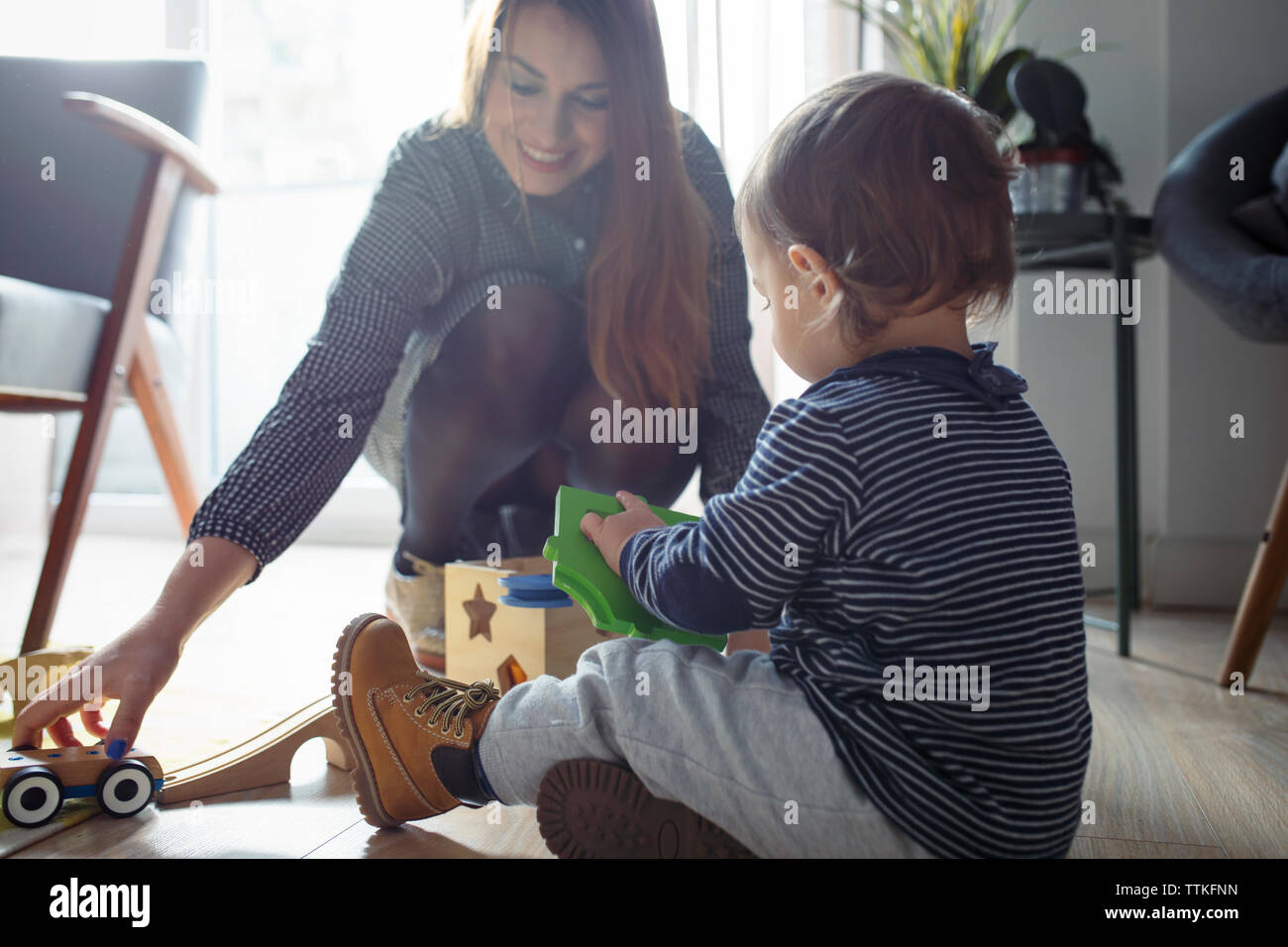 Adult playing toys hi-res stock photography and images - Alamy