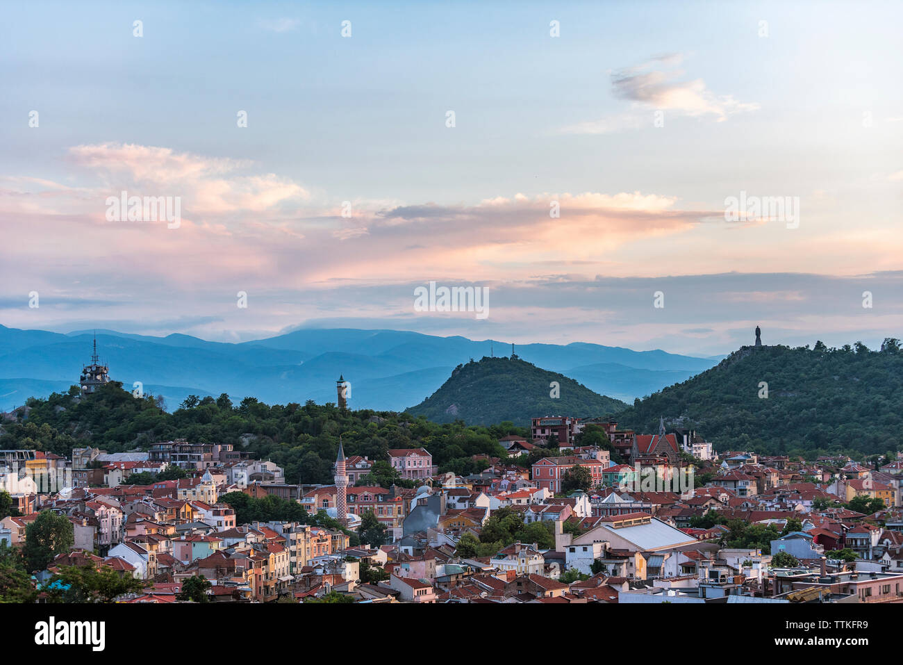 Summer sunset over Plovdiv city, Bulgaria. European capital of culture 2019 and the oldest living city in Europe. Photo from one of the hills Stock Photo