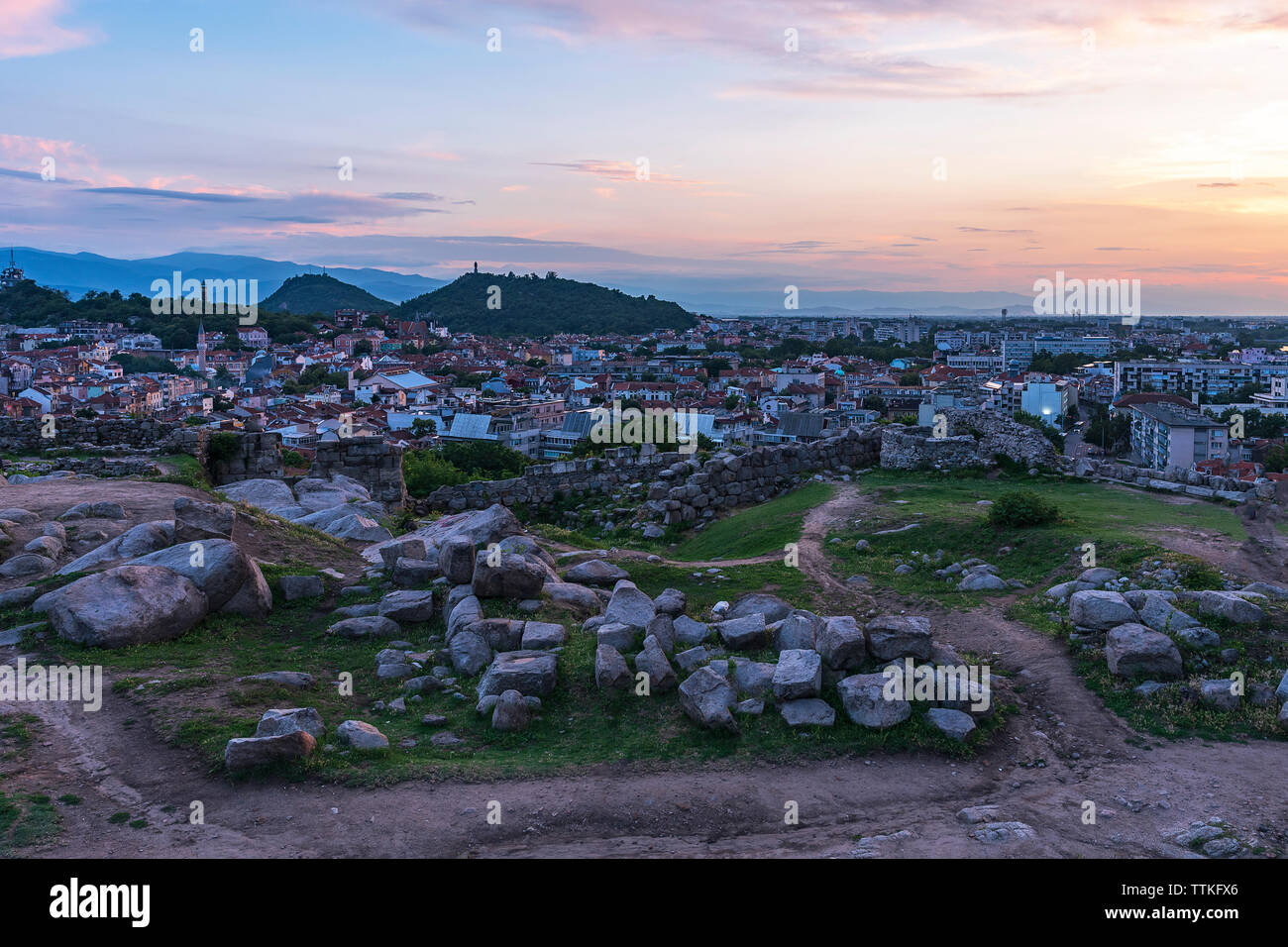 Summer sunset over Plovdiv city, Bulgaria. European capital of culture 2019 and the oldest living city in Europe. Photo from one of the hills Stock Photo