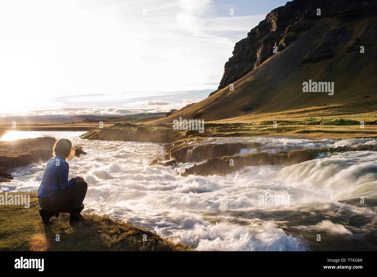 Woman kneeling water hi-res stock photography and images - Alamy