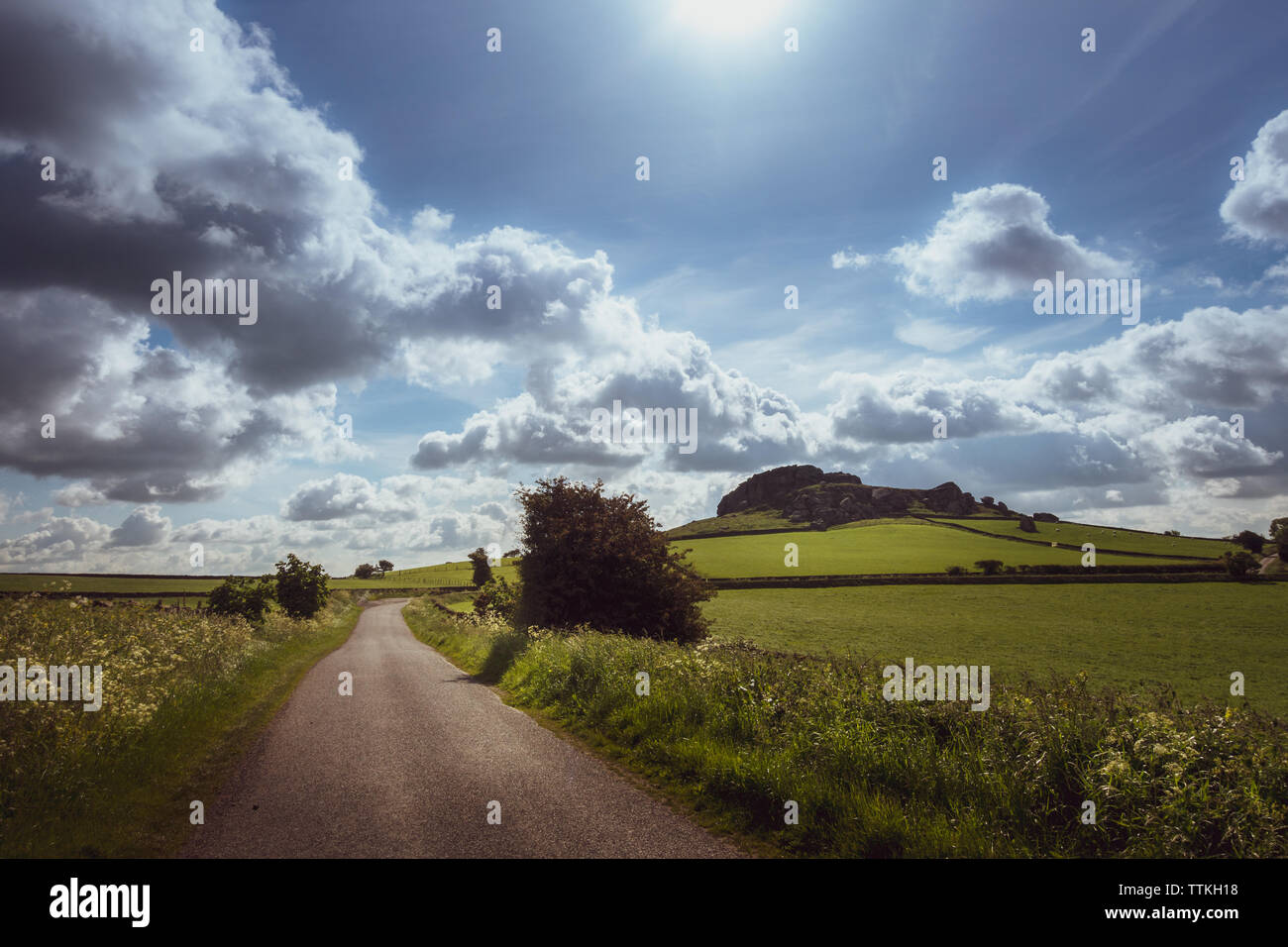 UK landscape: View of Almscliffe Crag from the country lane approaching it, North Yorkshire Stock Photo