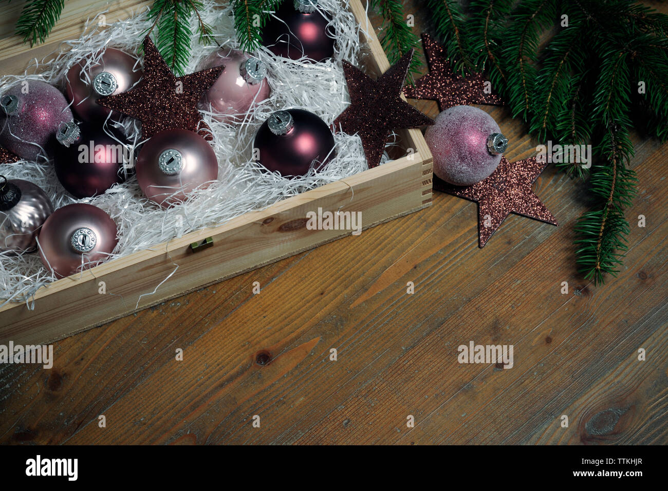 High angle view of christmas decorations on wooden table at home Stock Photo