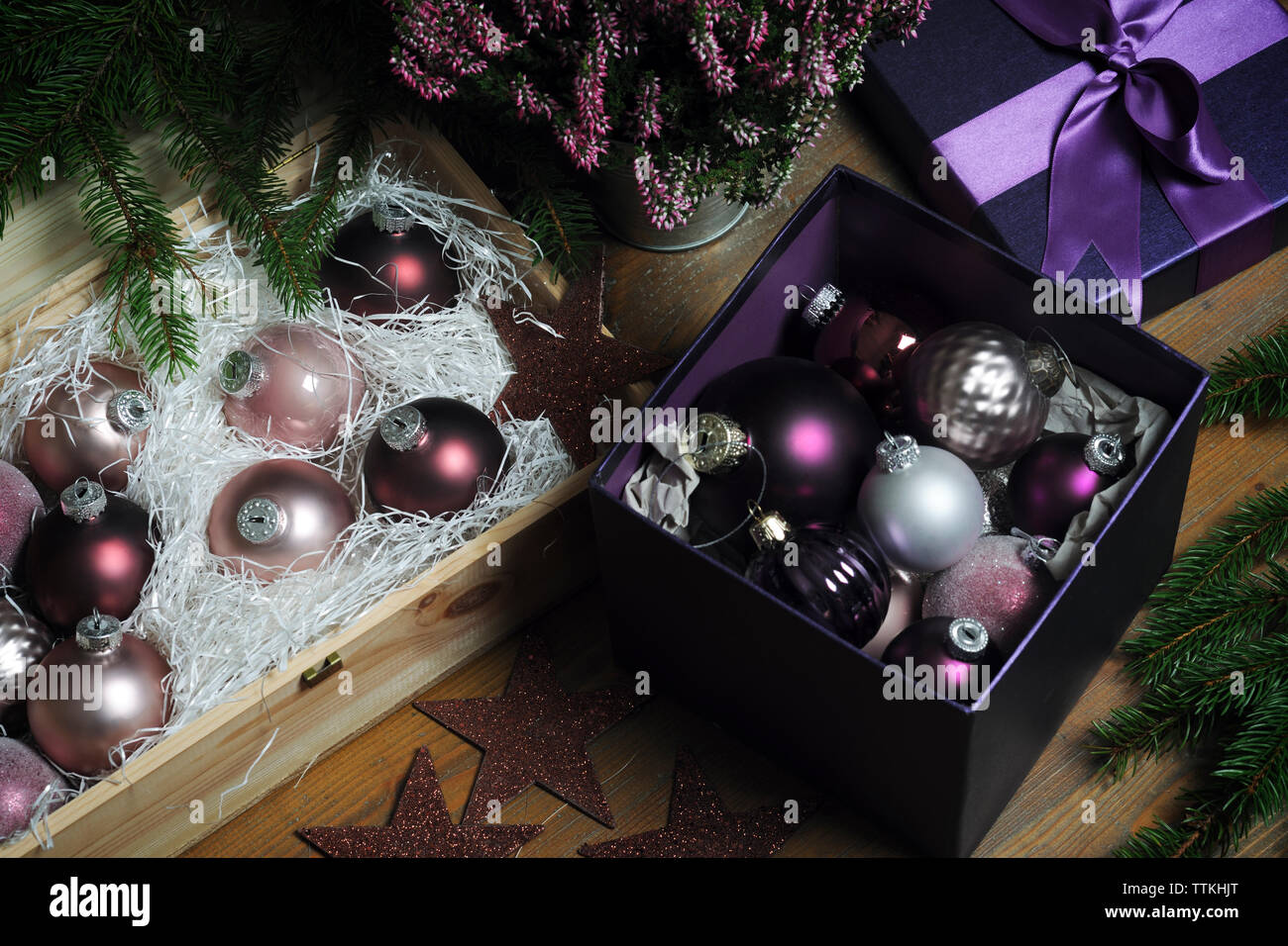 High angle view of colorful baubles with christmas decorations on table at home Stock Photo