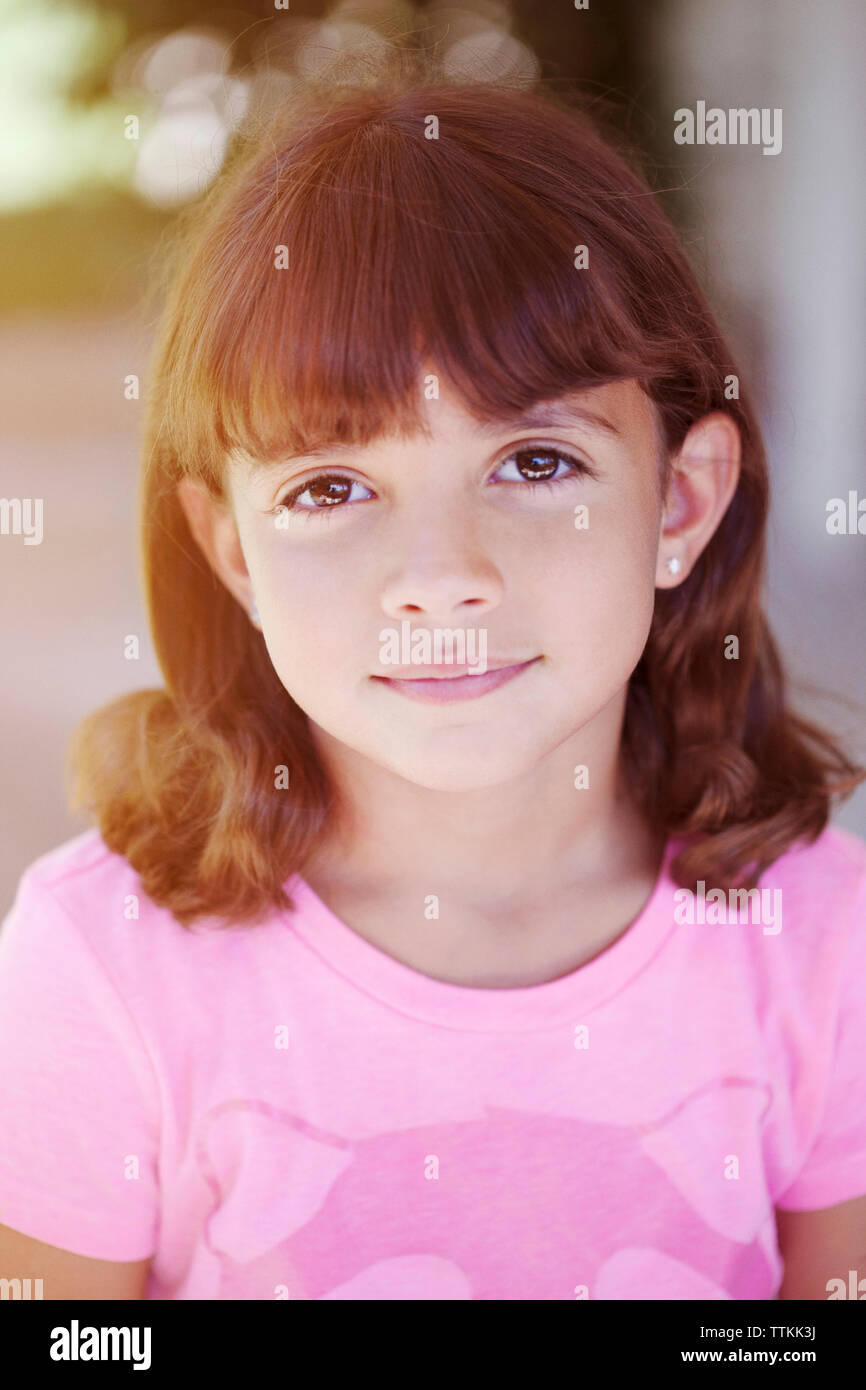 Portrait of smiling girl outdoors Stock Photo - Alamy