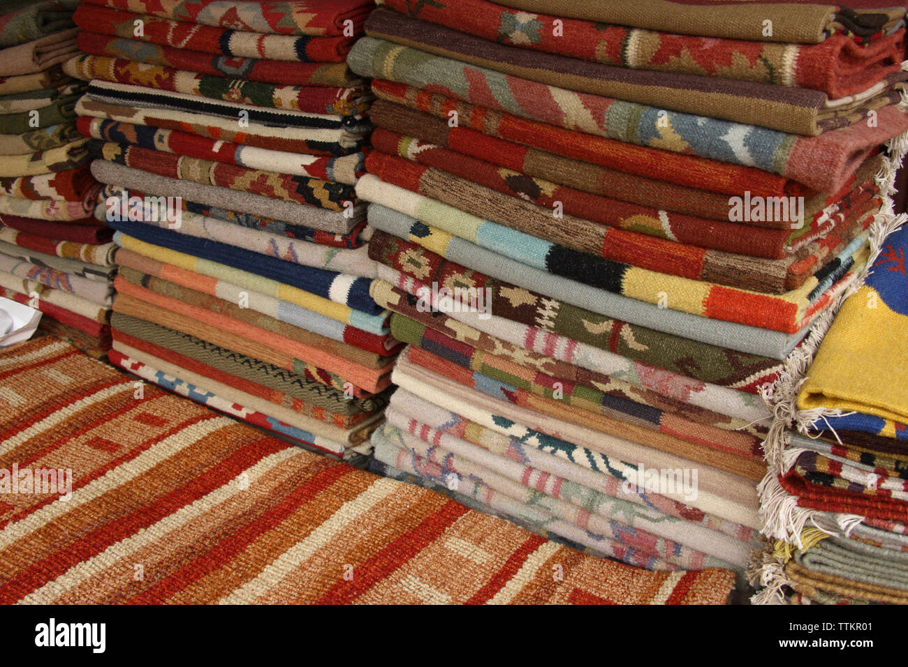 Rugs at a market stall, Dilli Haat, New Delhi, India Stock Photo Alamy
