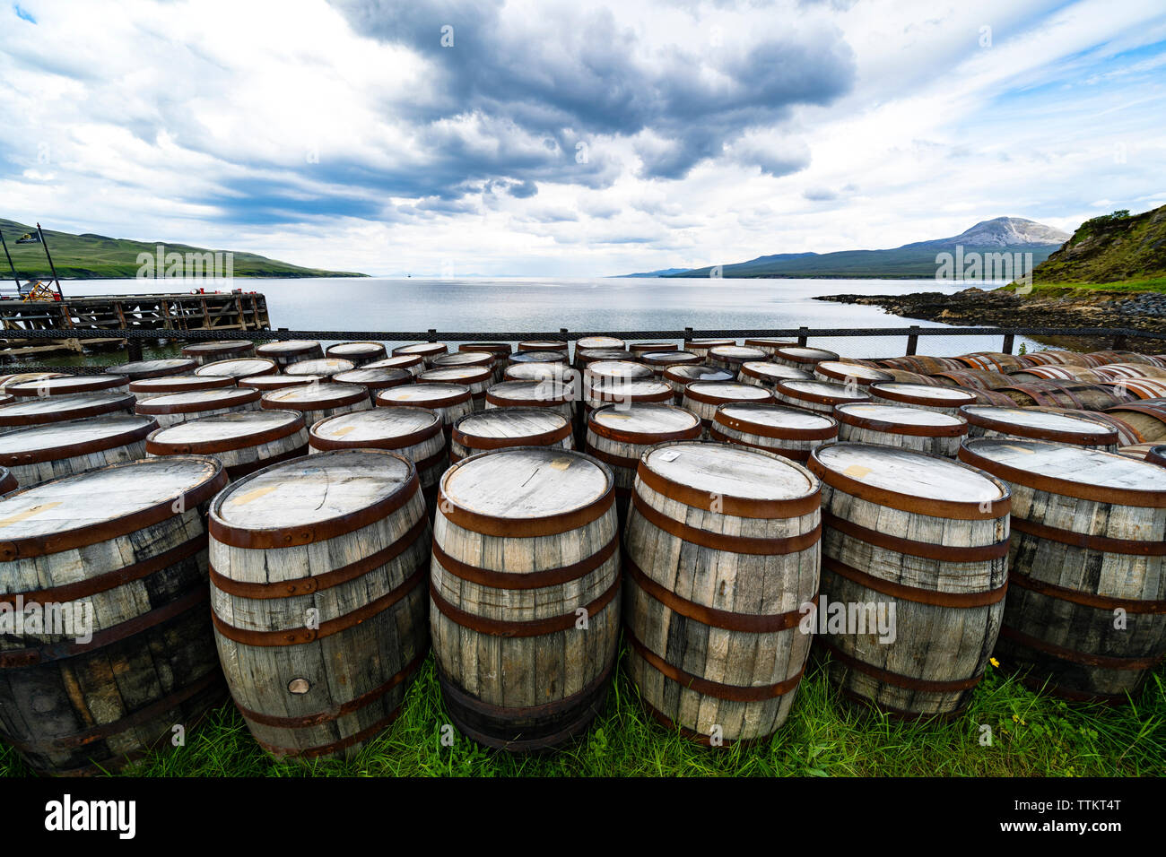 View of scotch whisky barrels at Bunnahabhain Distillery on island of Islay in Inner Hebrides of Scotland, UK Stock Photo