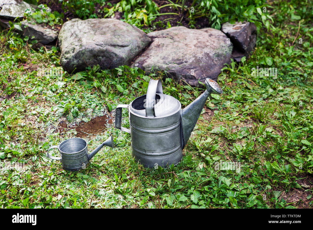 Watering cans hires stock photography and images Alamy