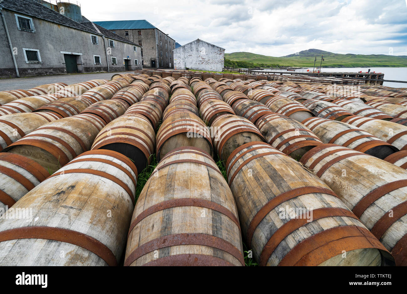 View of scotch whisky barrels at Bunnahabhain Distillery on island of Islay in Inner Hebrides of Scotland, UK Stock Photo