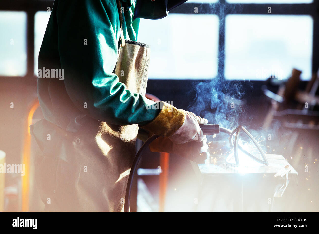 Jeweler welding a silver piece with a mini gas - oxygen torch welder Stock  Photo - Alamy