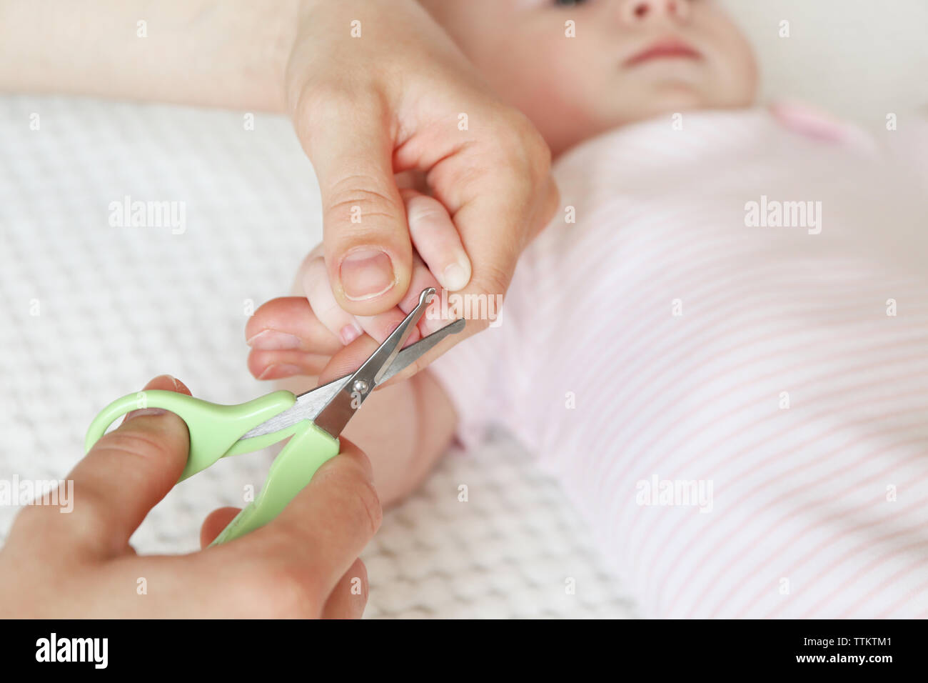 Cutting baby nails, closeup Stock Photo Alamy