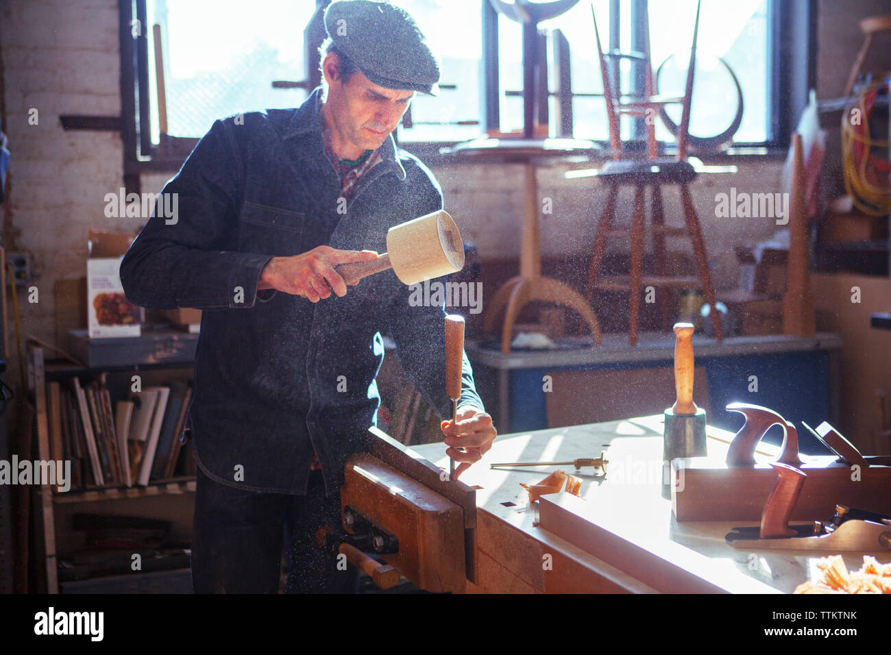 Male using wood chisel hi-res stock photography and images - Alamy