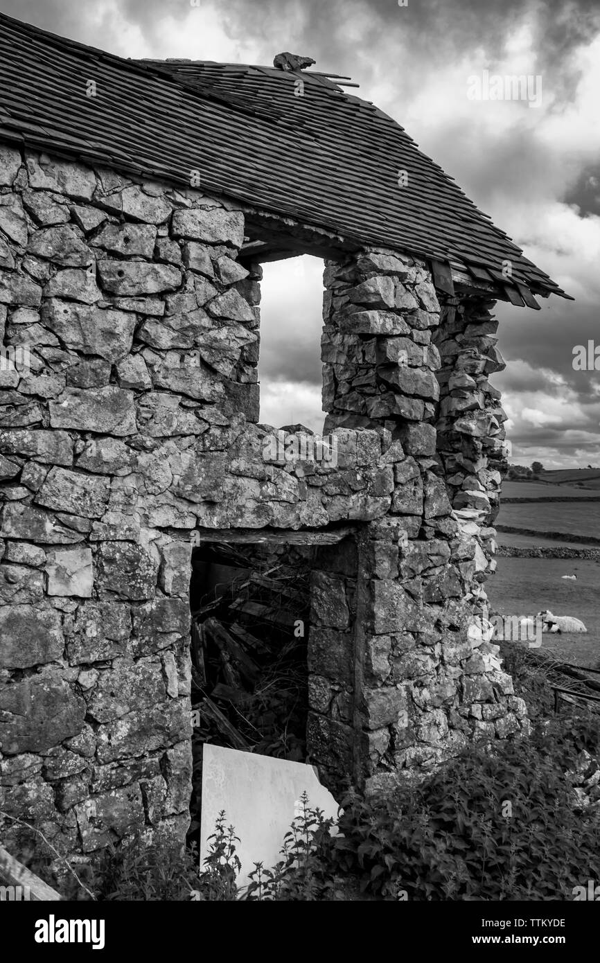 Old Derelict and Abandoned Stone Barn Building in a field near ...