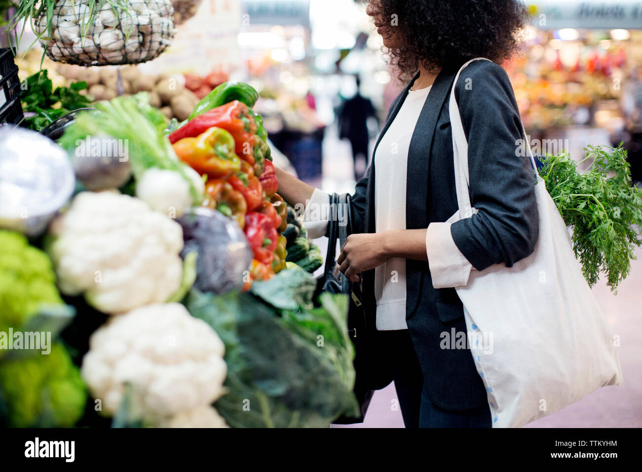 Side view woman curly hi-res stock photography and images - Alamy