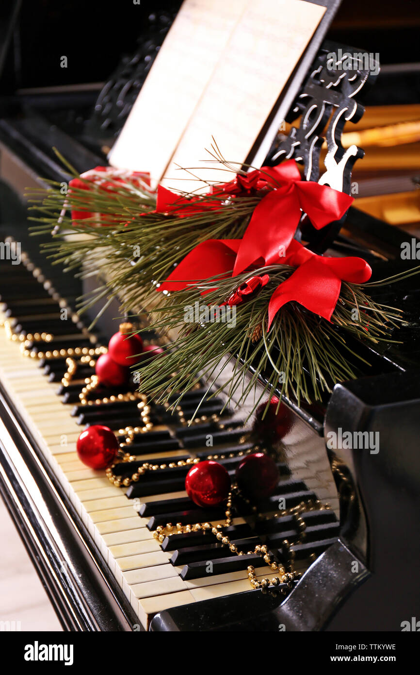 Christmas decoration on piano keys Stock Photo - Alamy