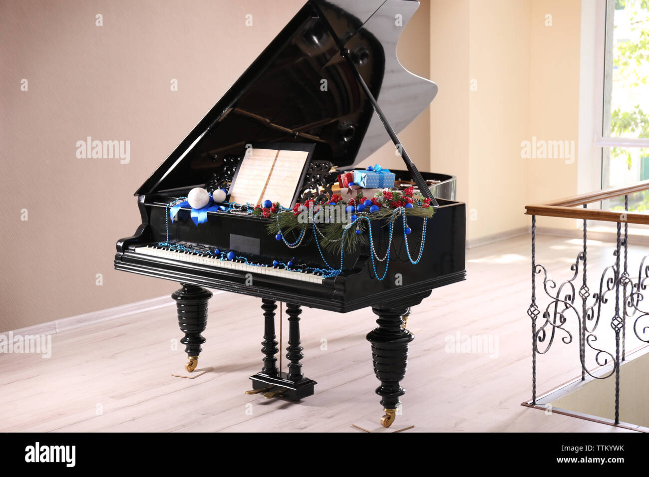 Piano with Christmas decoration Stock Photo