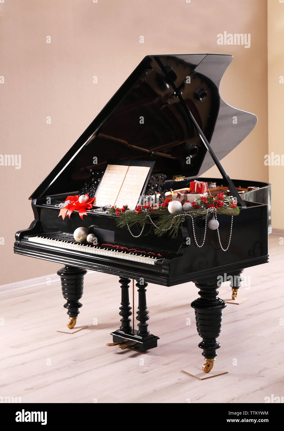 Piano with Christmas decoration Stock Photo