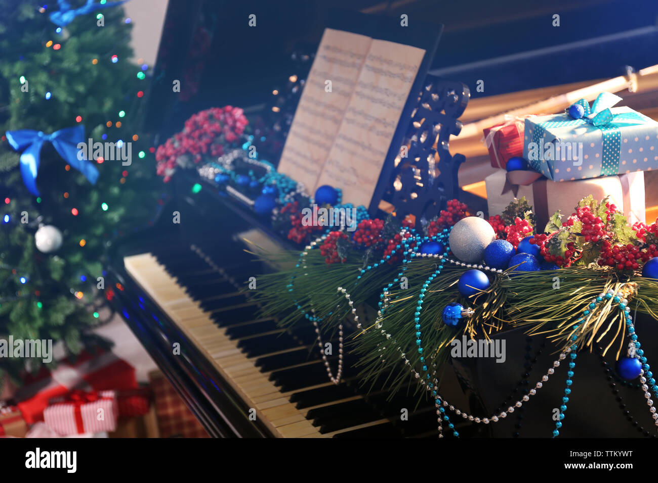 Piano with Christmas decoration Stock Photo - Alamy