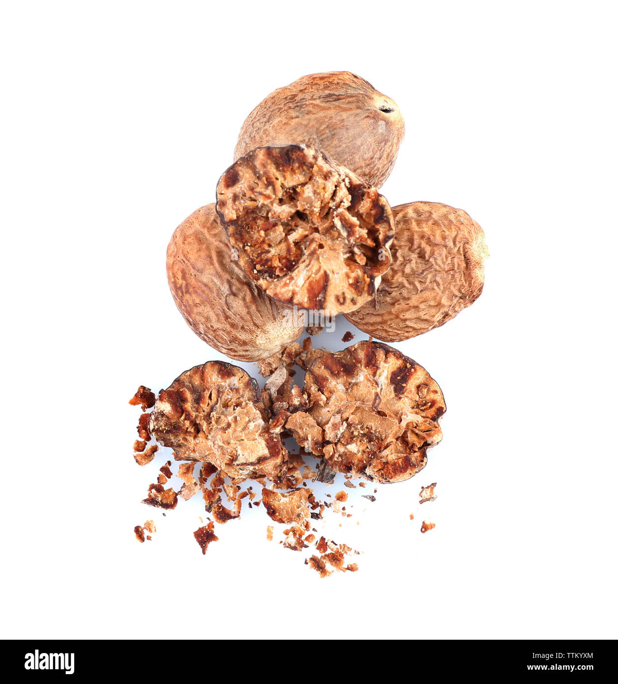 Crushed nutmeg isolated on white Stock Photo - Alamy