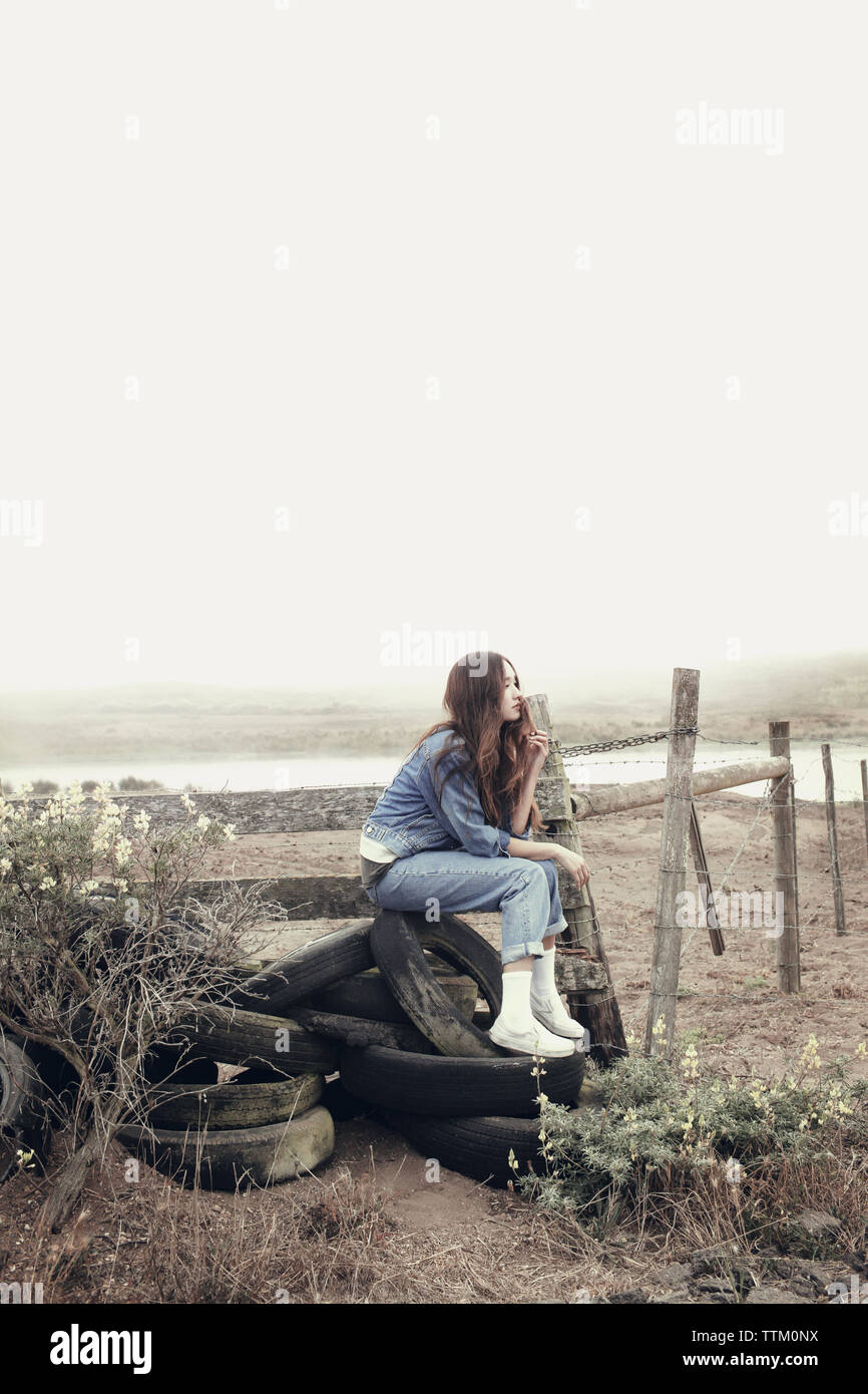Old woman in profile sitting hi-res stock photography and images - Alamy