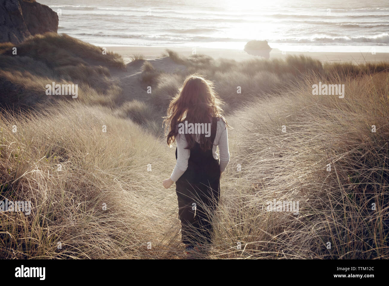 Woman in overalls walking field hi-res stock photography and images - Alamy