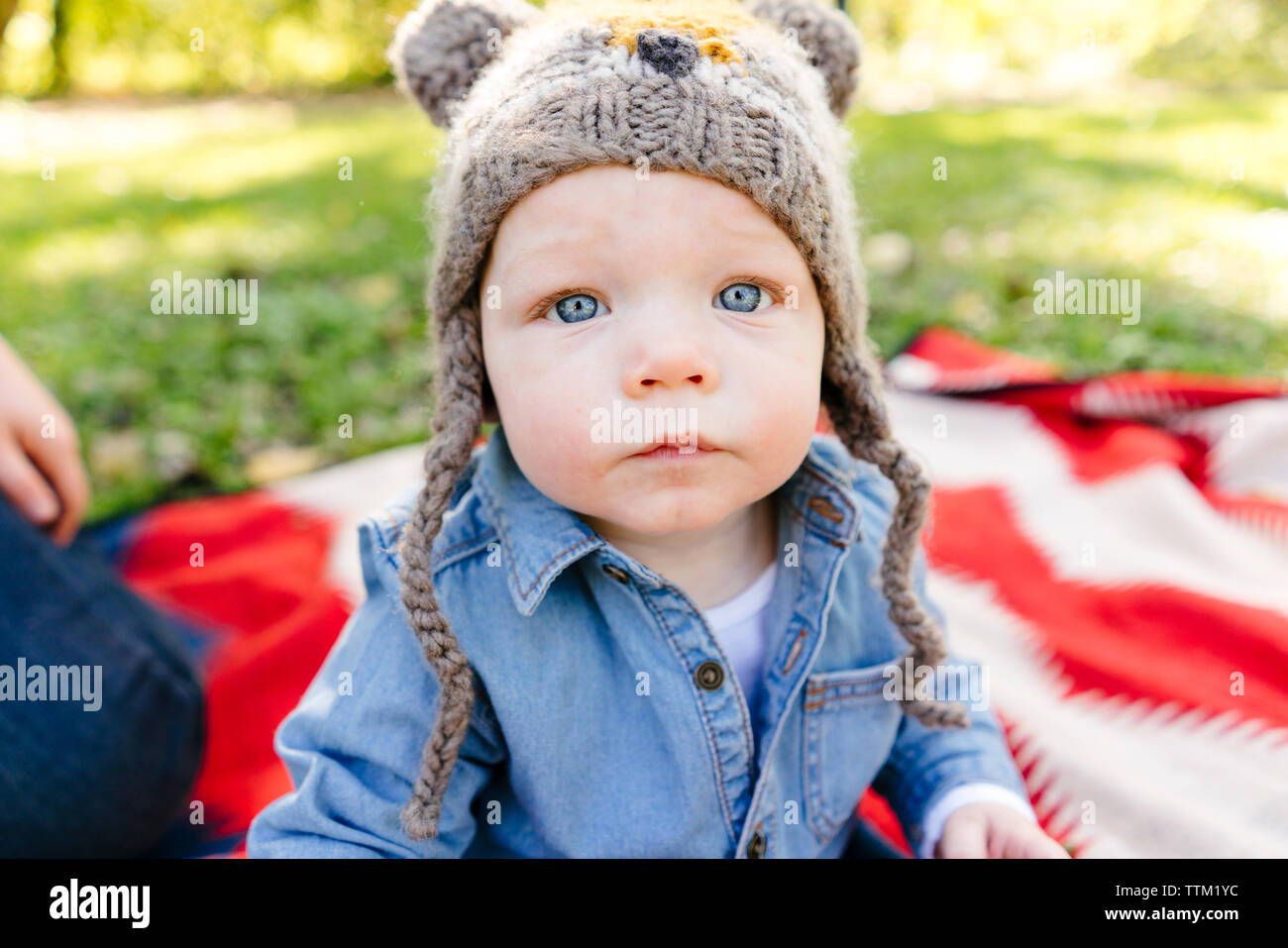 Closeup portrait of a baby boy wearing a hat Stock Photo