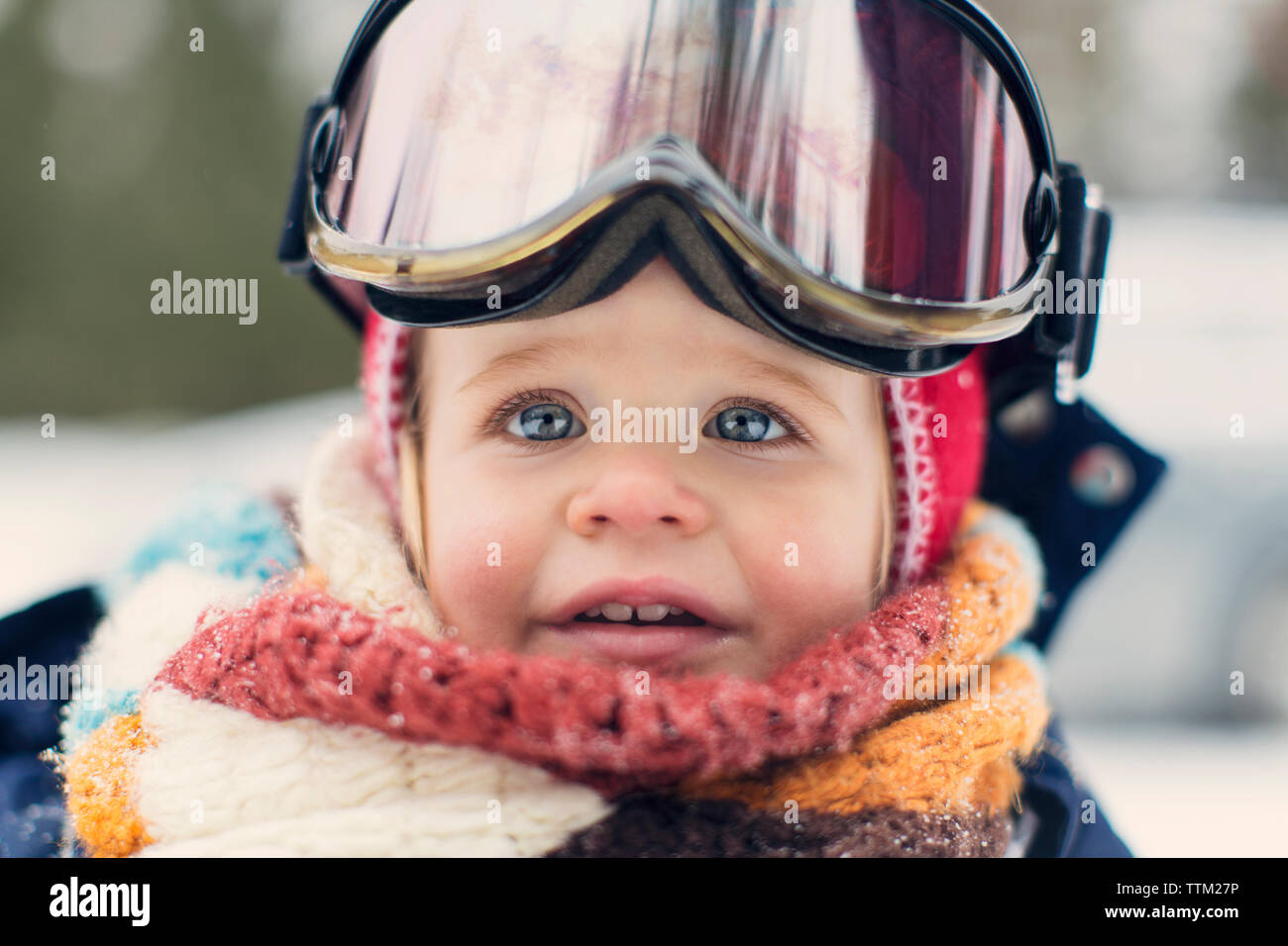 Close-up of baby girl wearing ski goggles Stock Photo