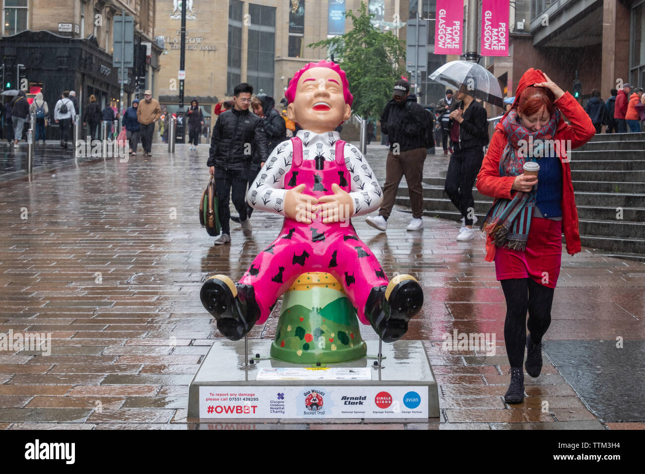 Glasgow, Scotland, UK. 17th June, 2019. Bonnie Oor Wullie, created by Shelley Jayne. This statue sees Oor Wullie adorned with the Symbols of Scotland combined into one colourful and highly decorative design. The sculpture is part of Oor Wullie’s BIG Bucket Trail. Credit: Skully/Alamy Live News Stock Photo