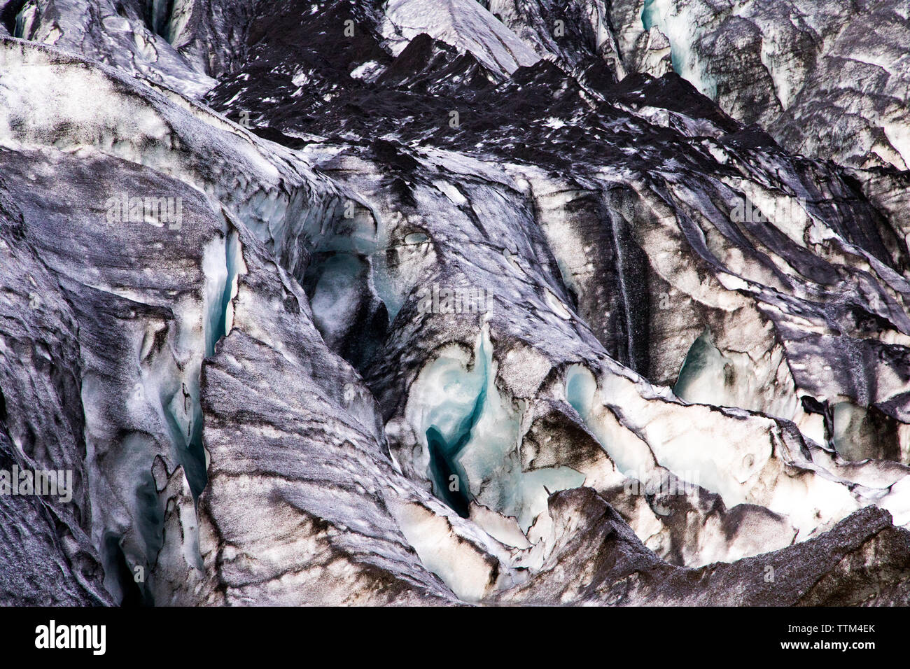 Glacier melting covered in dirt in VatnajÃ¶kull National Park Iceland Stock Photo