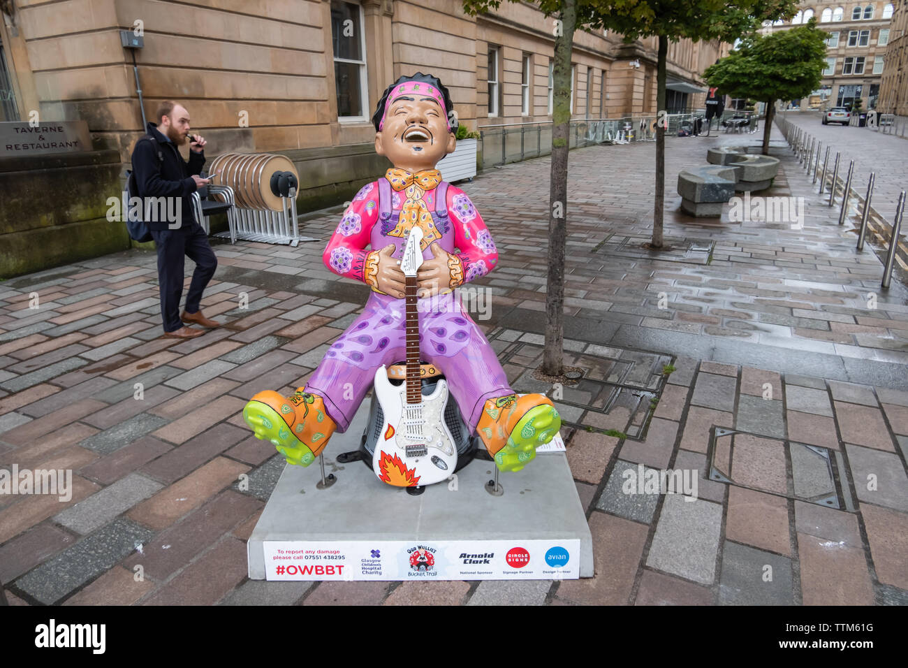 Glasgow, Scotland, UK. 17th June, 2019. Oor Jimi, created by Betti Moretti. The Jimi Hendrix Experience performed in Glasgow twice. Hendrix literally brought the house down with his performance by setting fire to his famous guitar on stage, This statue is in honour of Scotland's rich music history, complete with a replica of his legendary guitar. The sculpture is part of Oor Wullie’s BIG Bucket Trail. Credit: Skully/Alamy Live News Stock Photo