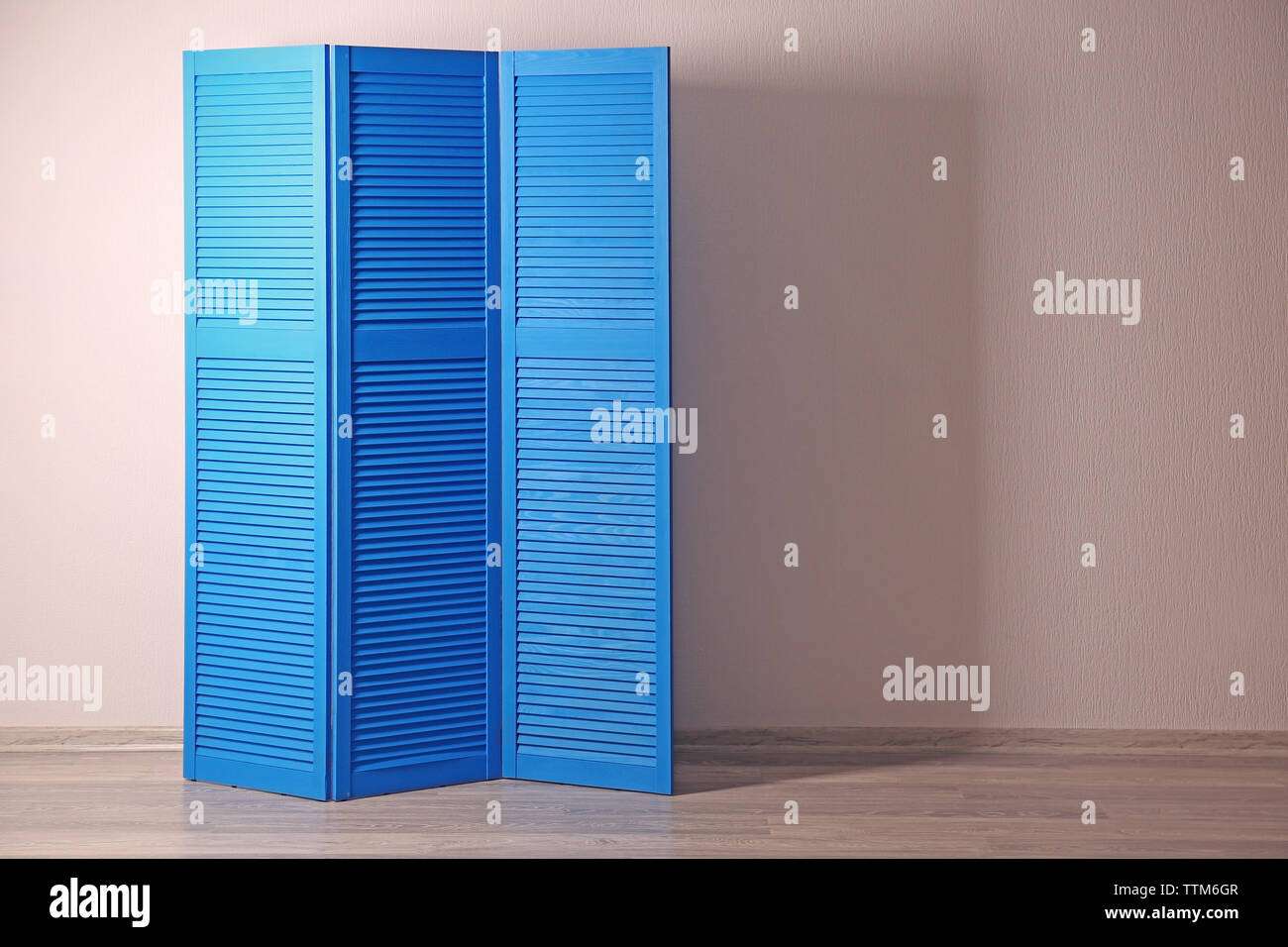 Blue folding screen in room Stock Photo Alamy