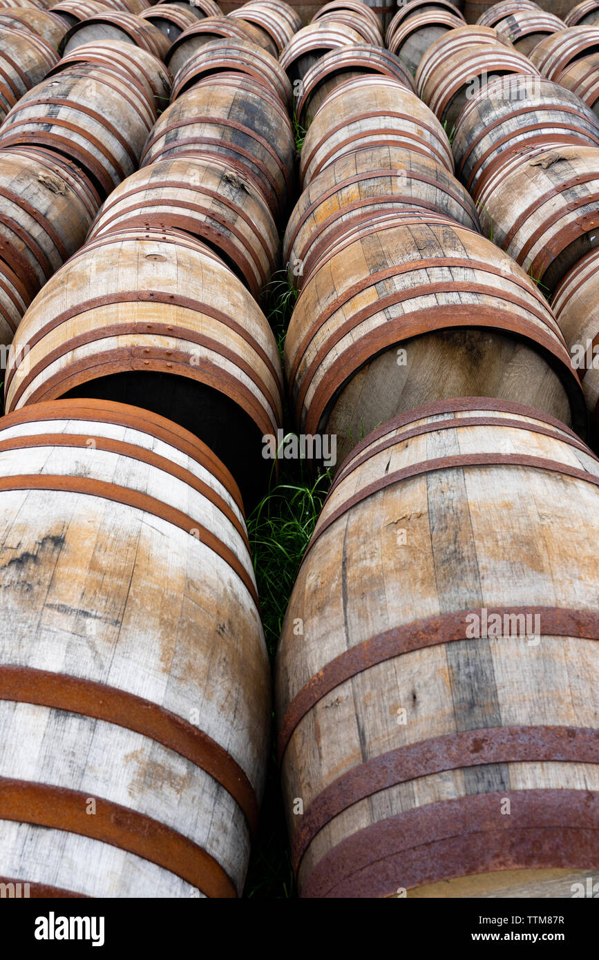 View of whisky barrels at Bunnahabhain Distillery on island of Islay in Inner Hebrides of Scotland, UK Stock Photo