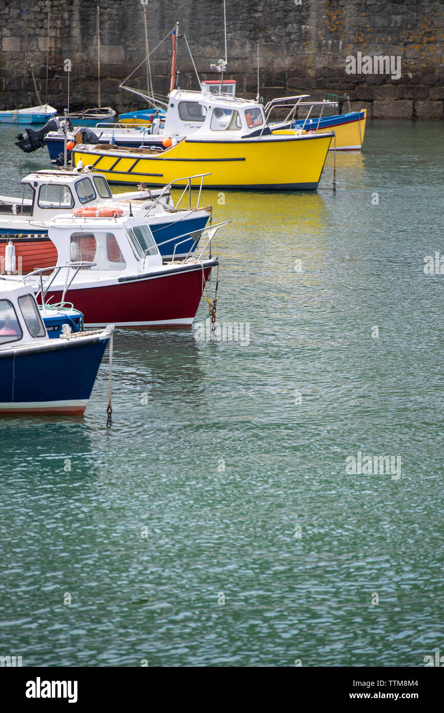 Boats in the harbour at Porthleven in Cornwall, England Stock Photo Alamy