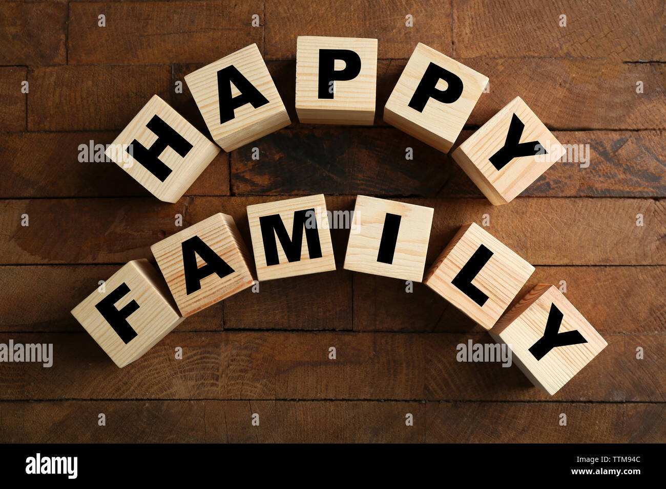 Words HAPPY FAMILY on wooden background Stock Photo - Alamy Words HAPPY FAMILY on wooden background Stock Photo - Alamy