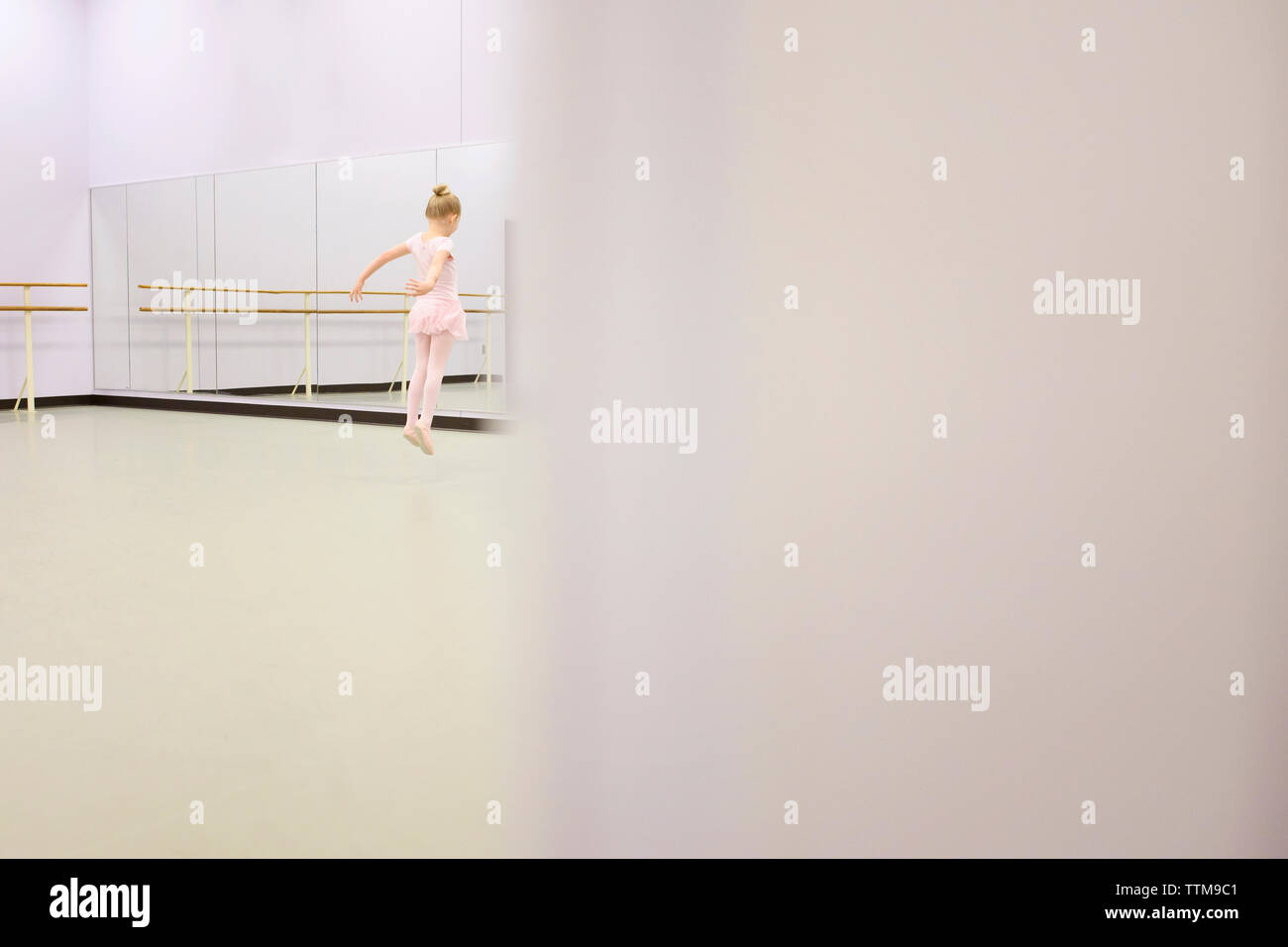Girl dancing in front of mirror Stock Photo Alamy