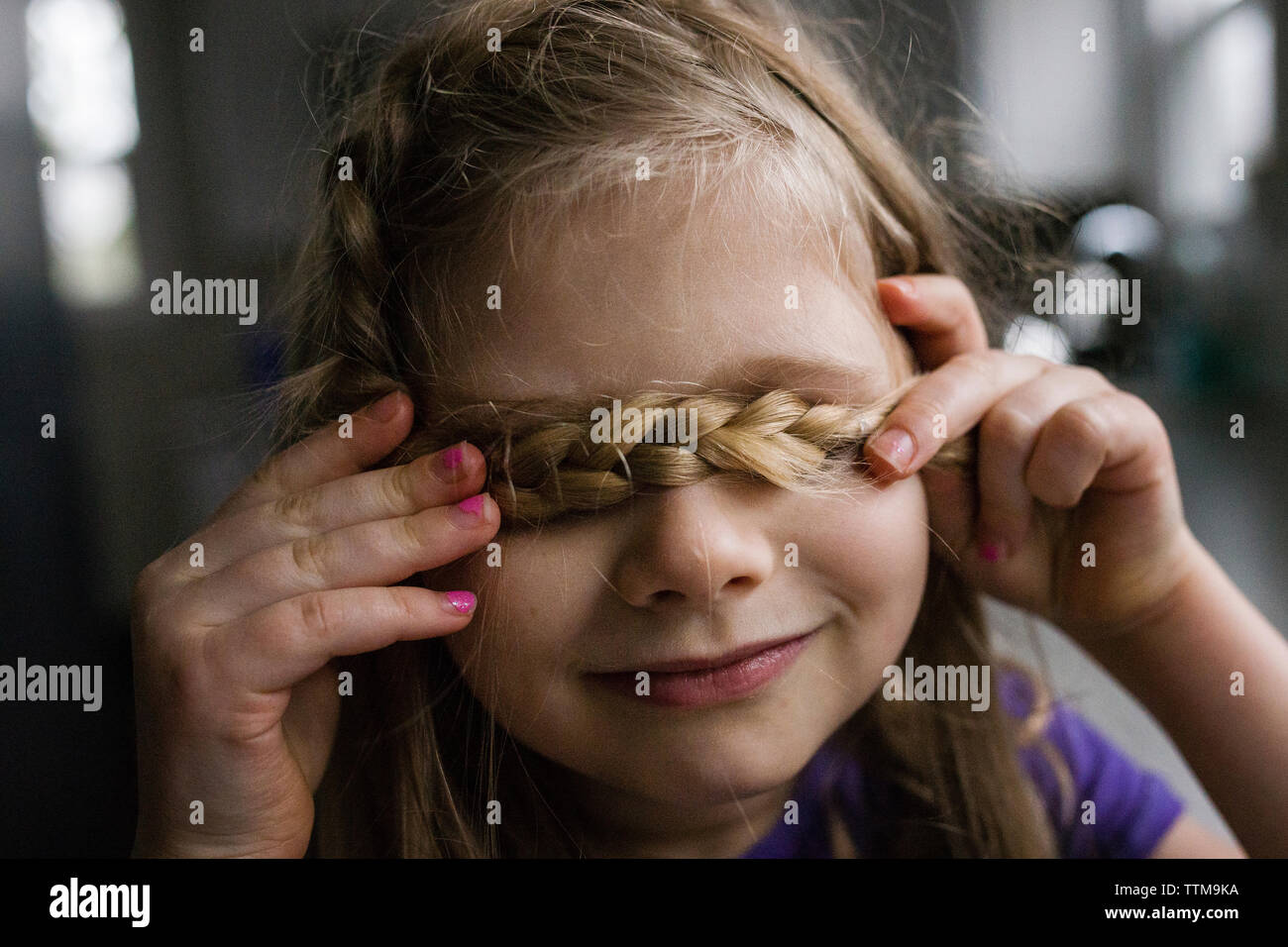 Girl with hair covering face hires stock photography and images Alamy