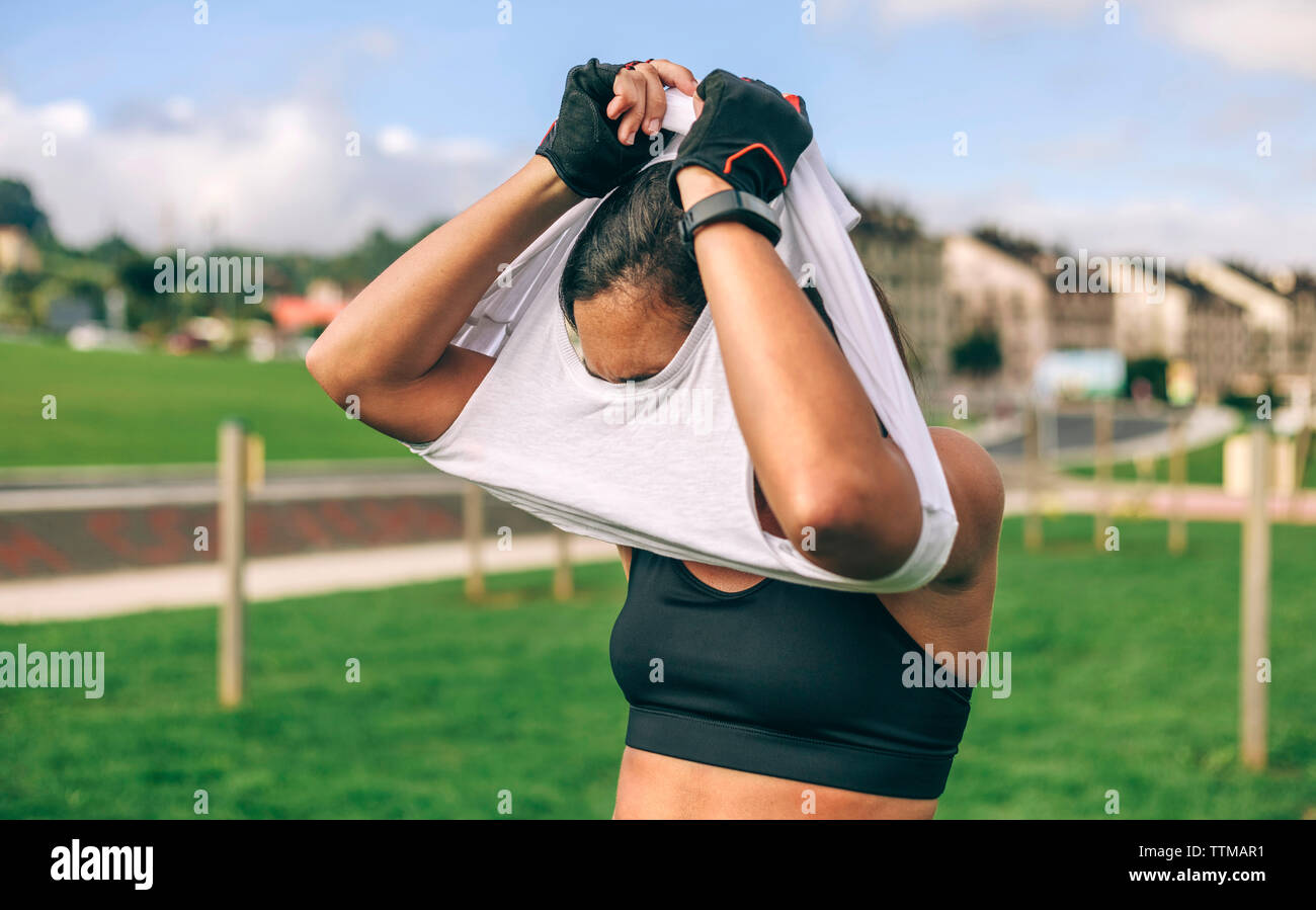 taking sports bra off